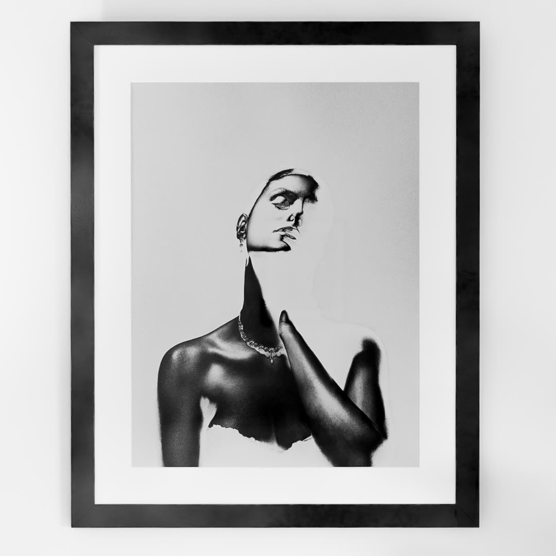 Persona, framed with a white mat on a white wall: a woman's face in light above a dark, metallic shoulder and chest, one hand raised to the throat